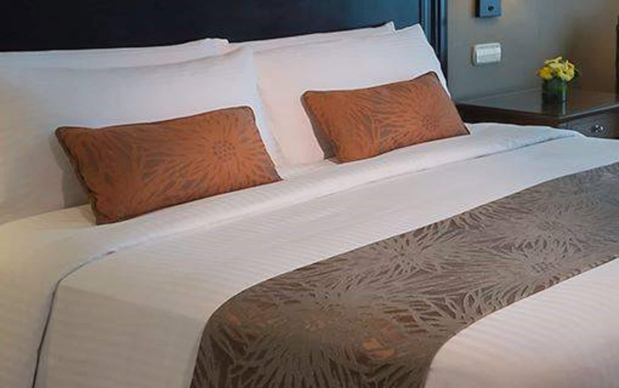 Marco Polo Davao Hotel Exterior photo A bed runner