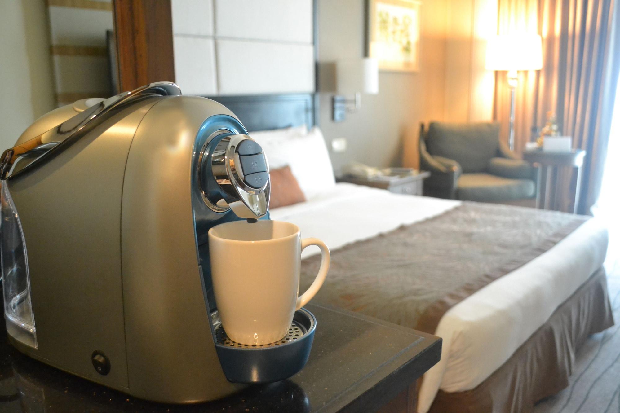 Marco Polo Davao Hotel Exterior photo A Nespresso machine in a hotel room