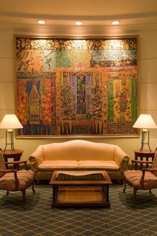 Marco Polo Davao Hotel Exterior photo The lobby of the Four Seasons Hotel, Washington, D.C.