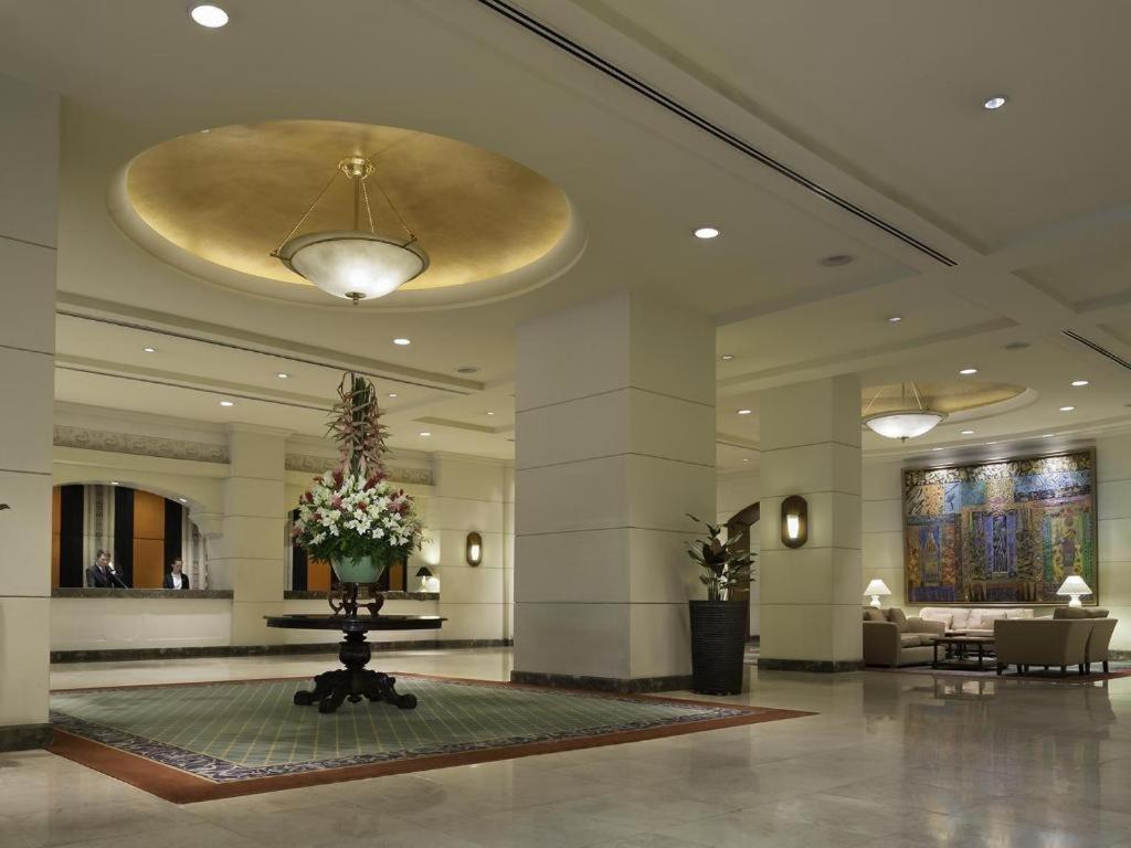Marco Polo Davao Hotel Exterior photo The lobby of the Taj Bengal