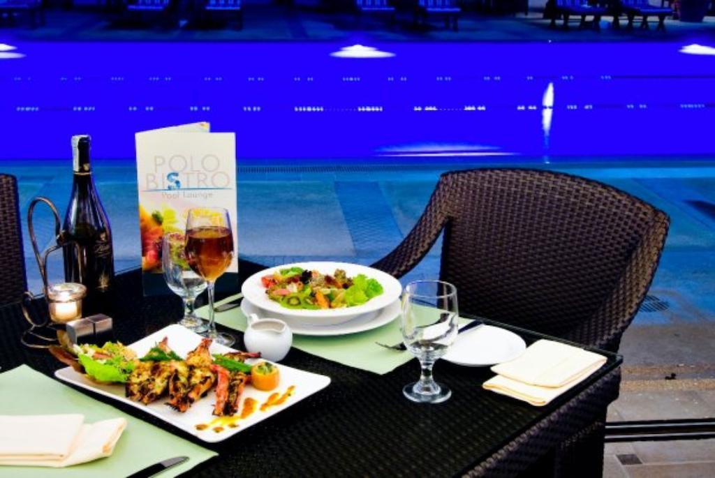 Marco Polo Davao Hotel Exterior photo Poolside dining at the hotel
